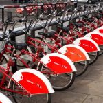 Car Rental Deals - Parked Red and White Bicycles